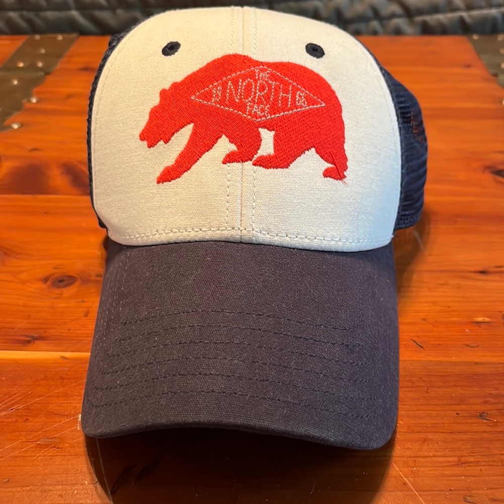 North Face trucker hat.